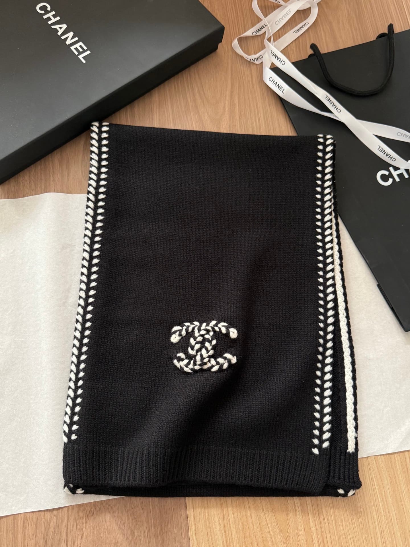 Chanel Chanel Batch of black knitwear with white double C embroidery