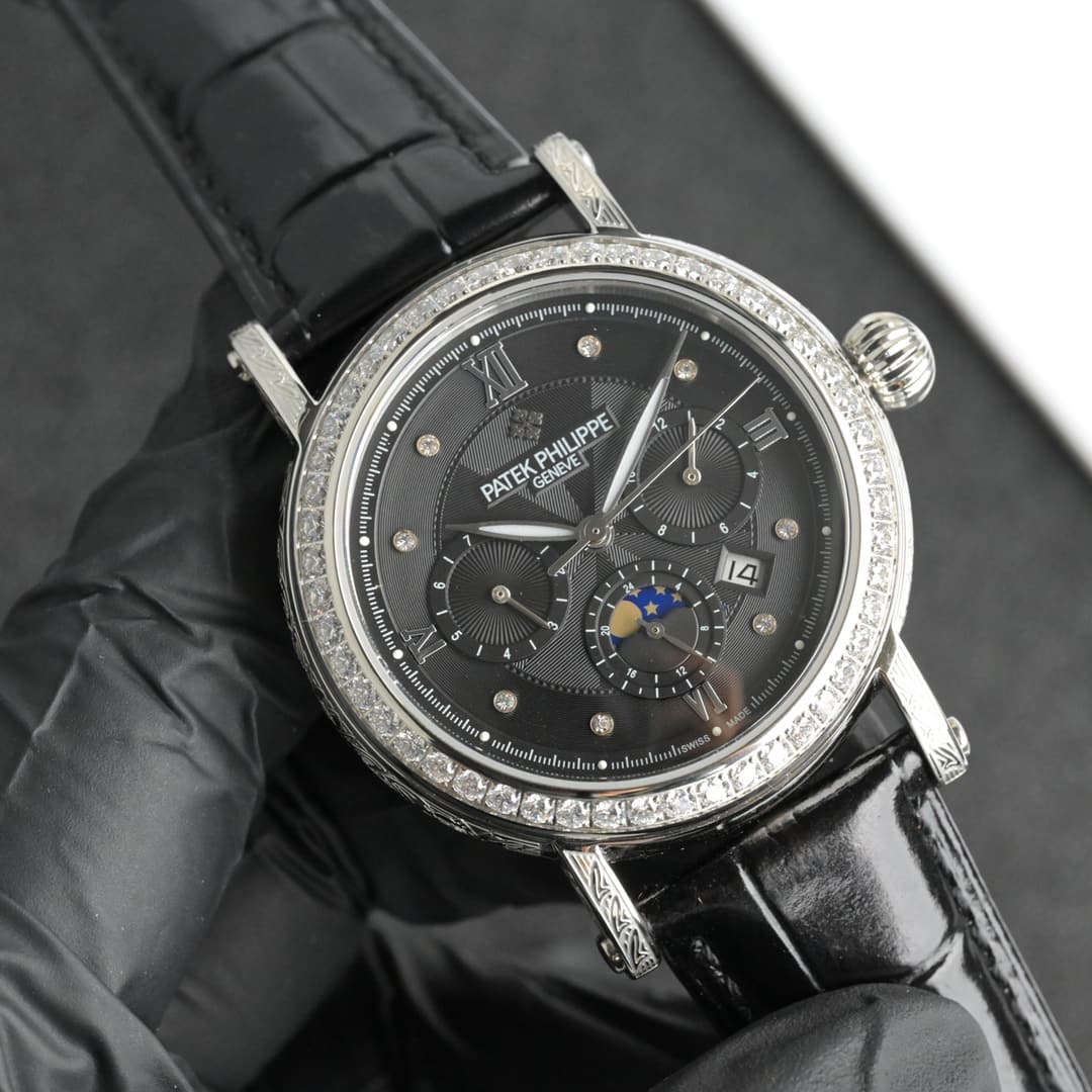 Patek Philippe Patek Philippe Complications Collection—Handcrafted—Engraved Watch