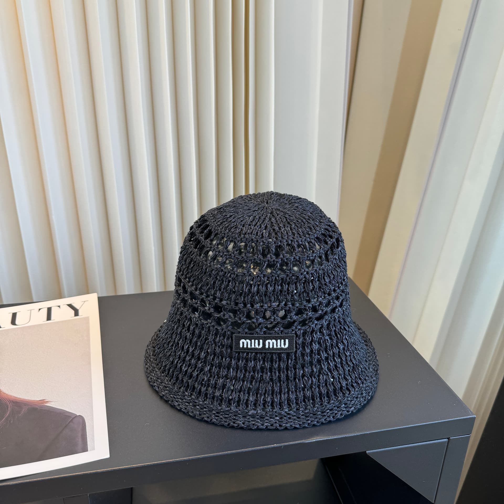 Unassigned MiuMiu's Latest Fisherman's Hat: A Fashion-Forward, Casual Design