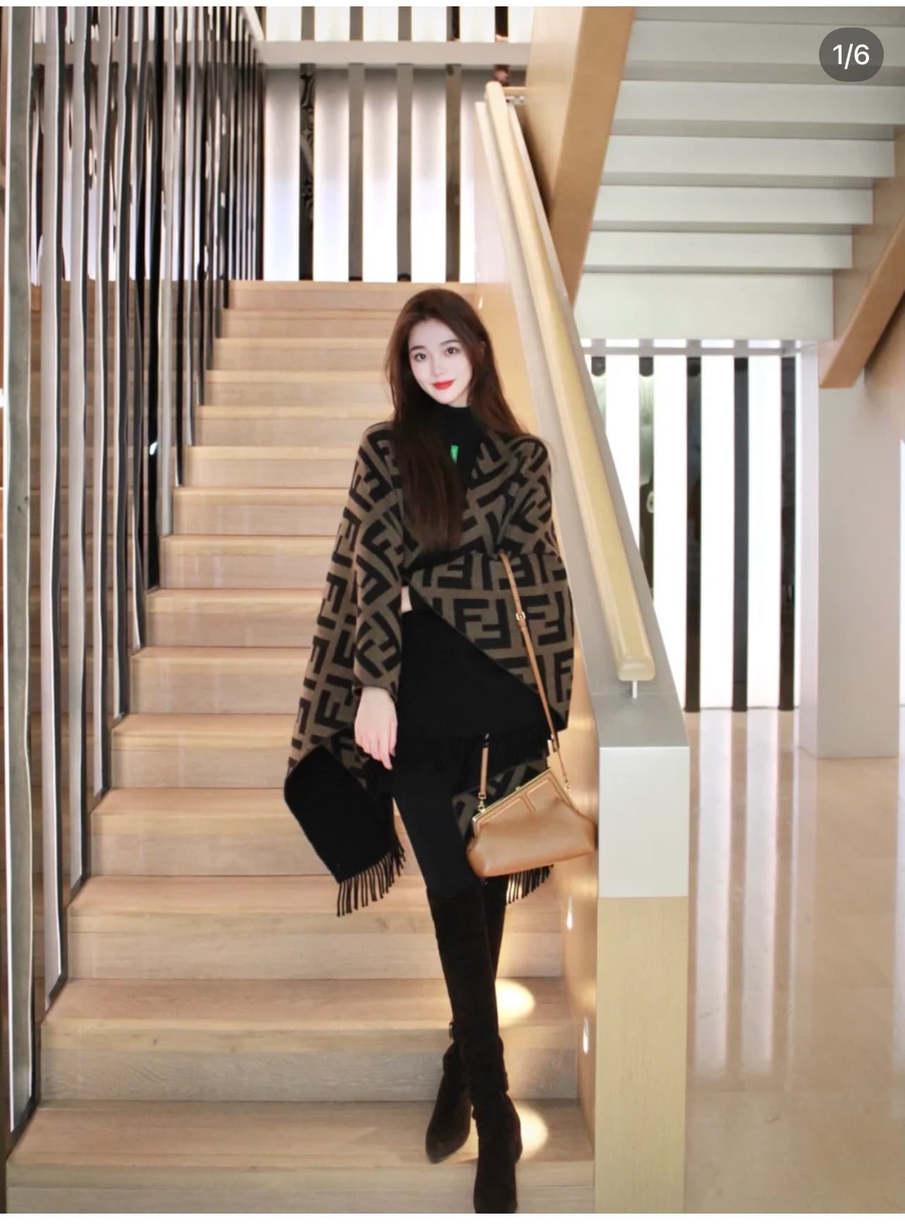 Fendi Fendi ▪ Reversible, two-tone cape—FF’s style speaks for itself. A design like this...