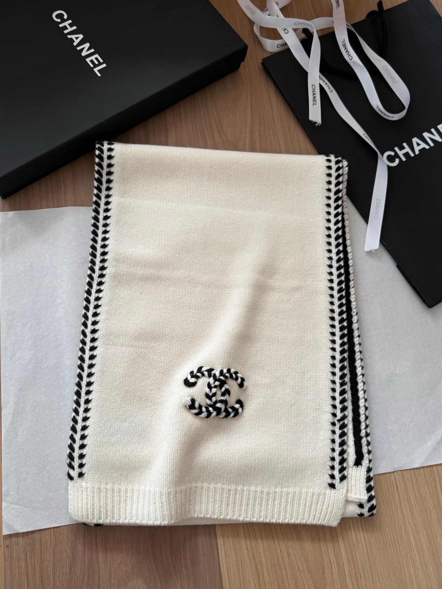 Chanel Chanel Batch of black knitwear with white-stitched double C logo