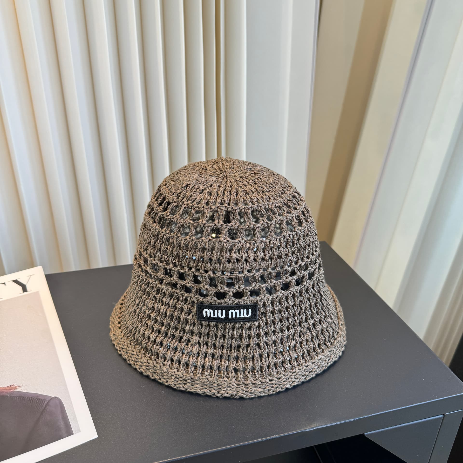 Unassigned Miu Miu’s Latest Fisherman’s Hat: A Fashion-Forward, Casual Design