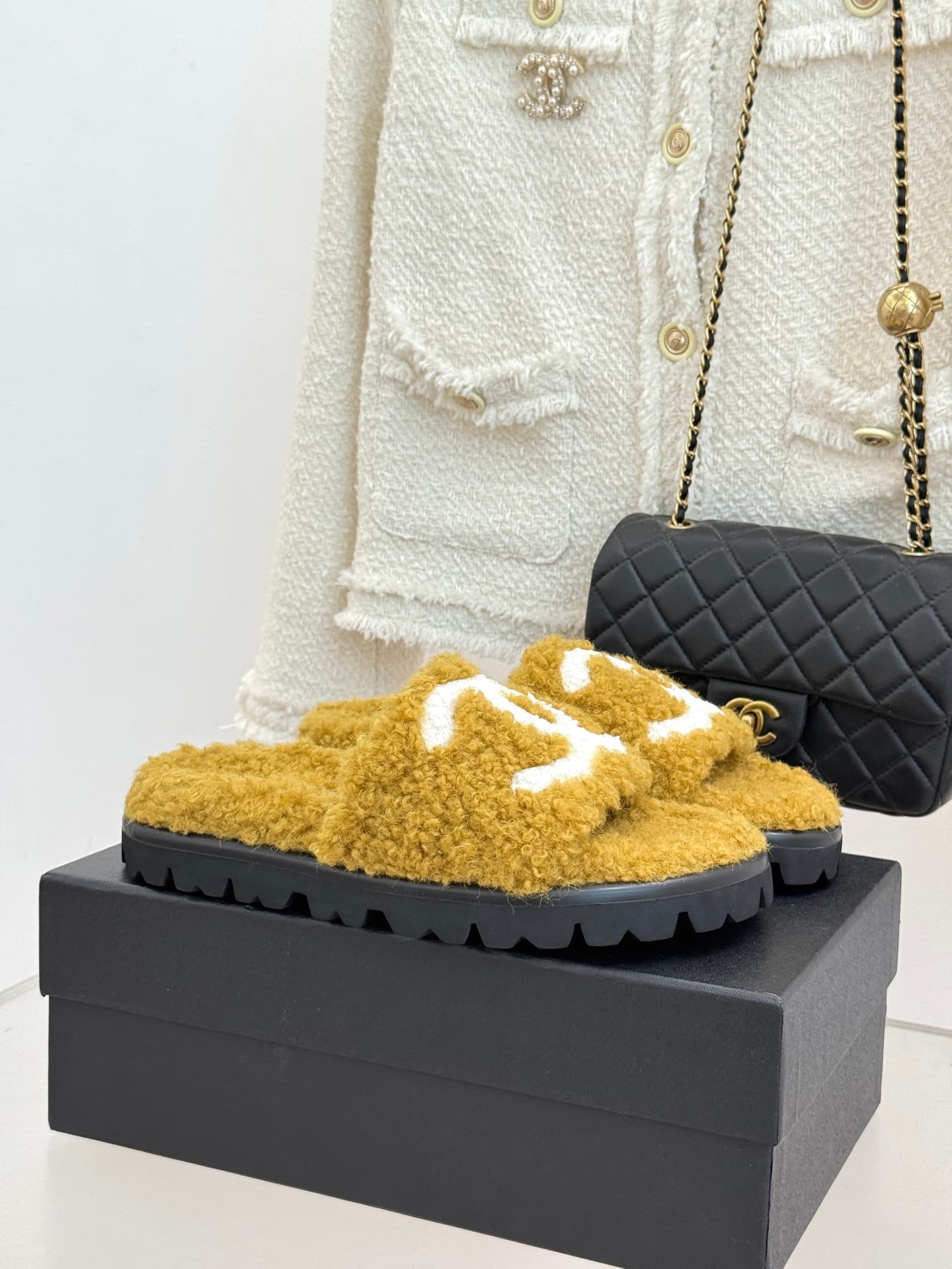 Chanel Chanel CHANE Classic Chanel Double C Faux Fur Slippers—The Double C Is the Essence of the Classic; The Thick Sole Subtly Elongates the Legs